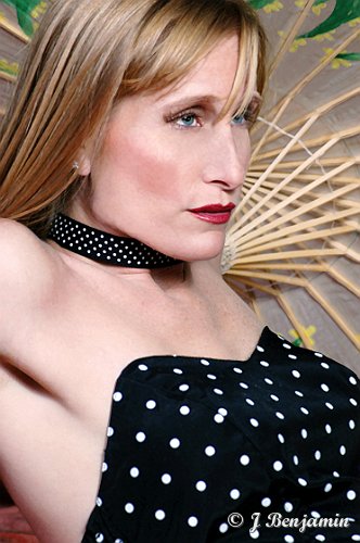 Female model photo shoot of Dana Sue by J Benjamin in SoDo Studio, Seattle, makeup by Pink Beauty