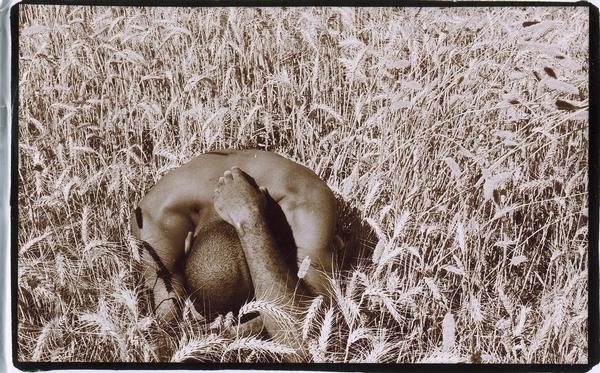 Male model photo shoot of brima in a field in davis, california