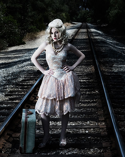 Female model photo shoot of Nicole Szuch Photo in rail road track, montecito ca