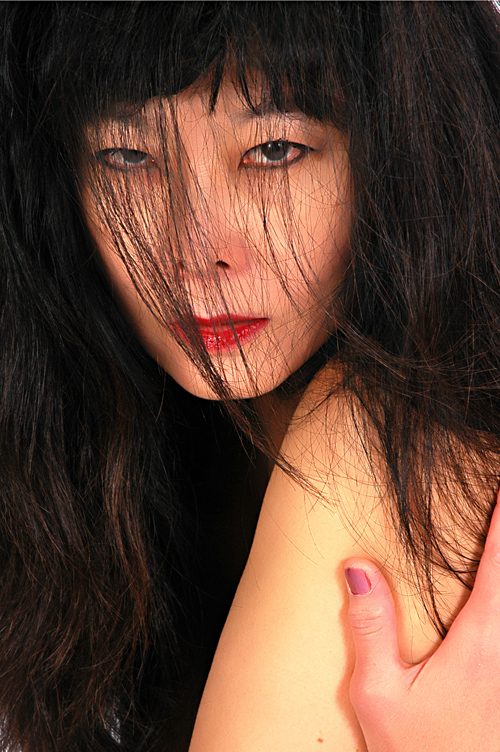 Female model photo shoot of HwiCheng by Fotowerks LLC in Studio