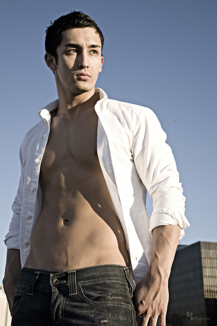 Male model photo shoot of Liger Alex by Leslyn Rodriguez in top of the garage