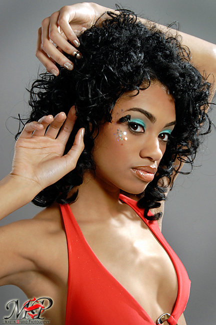 Female model photo shoot of J Sharps by Martin Studio Photography, hair styled by koolhair