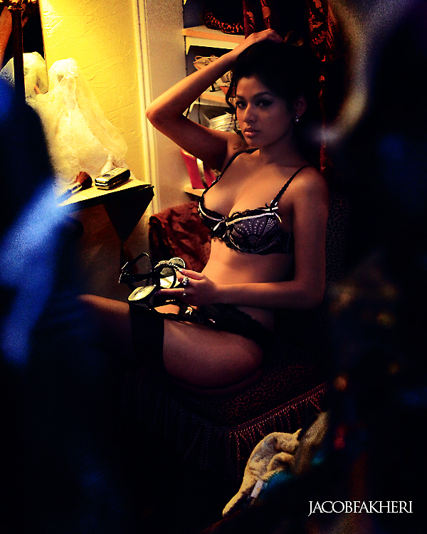 Female model photo shoot of Somaly M by JACOBFAKHERI in Dorians crib