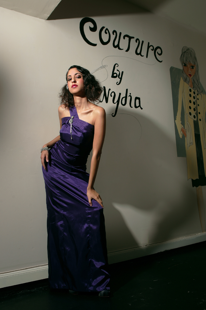Female model photo shoot of Couture by Nydia and Coneli in Couture by Nydia Studio, makeup by Constanza Eliana