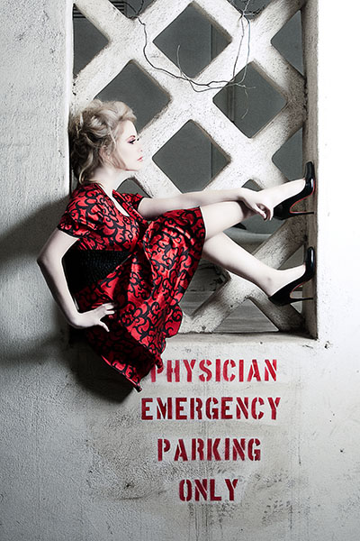 Female model photo shoot of Nicole Szuch Photo in abandoned hospital
