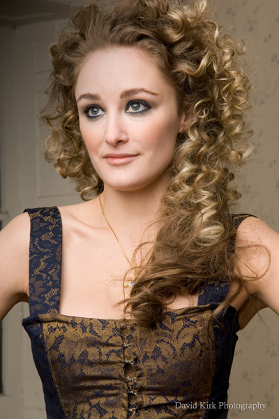 Female model photo shoot of Lemar Hair Studio