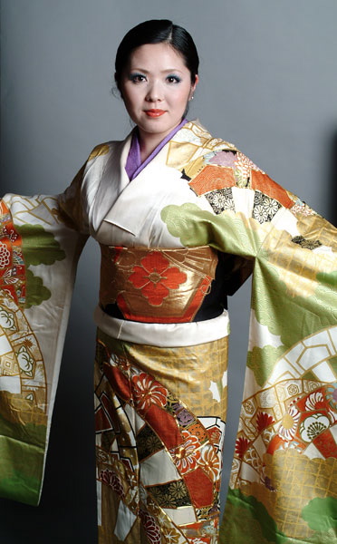 Female model photo shoot of Kitsuke kimono dressing by stevejonesimages in M1NT, Jermyn Street, London, UK, wardrobe styled by Kitsuke kimono dressing