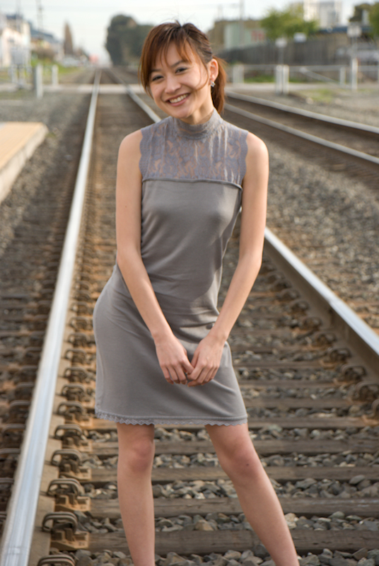 Female model photo shoot of Corliss L by iApparels in Berkeley train station