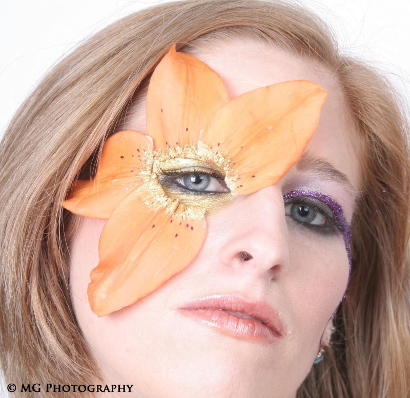 Female model photo shoot of LightningStorm by MG Photo-graphy, makeup by Suri S Cadena