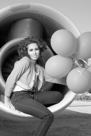 Female model photo shoot of driee in airplane junk yard