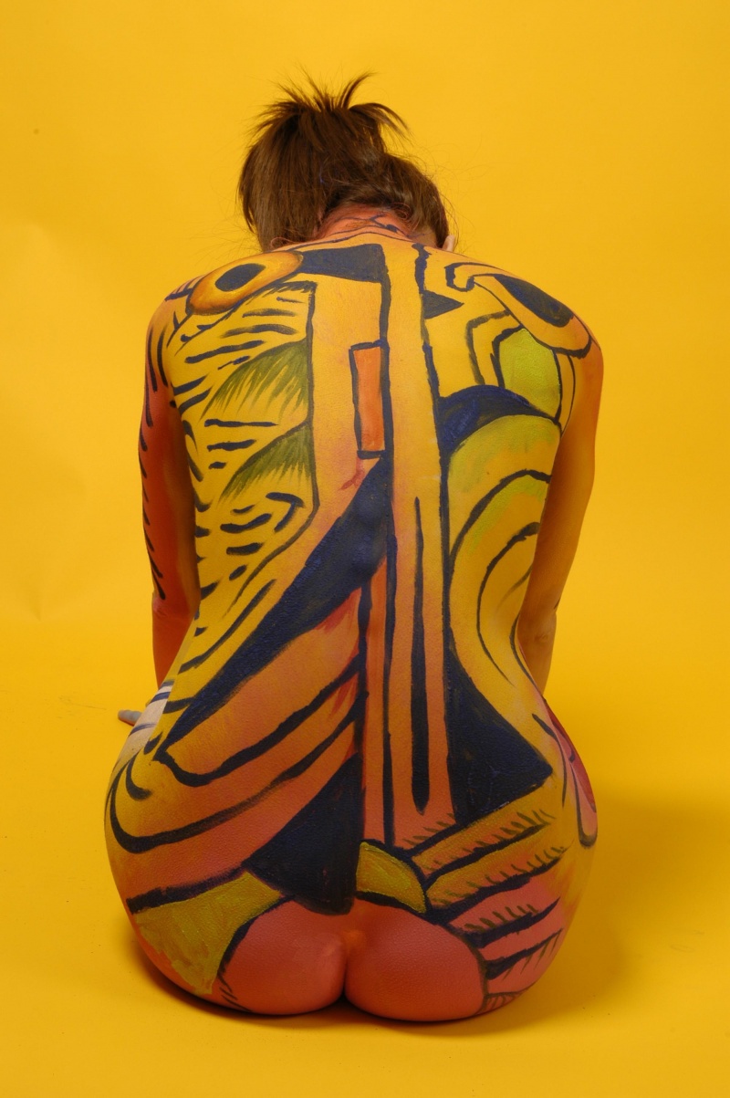 Female model photo shoot of Nikki Babylon by ARON - DreamCasters, body painted by Andy Golub