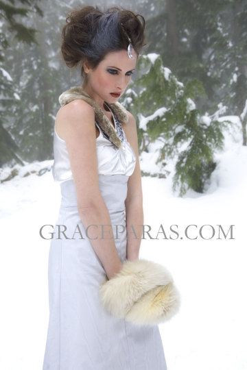Female model photo shoot of Amie Payne by Mizokie in snowy mountain, makeup by Carmelle da Roza