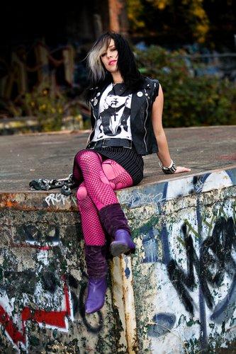 Female model photo shoot of Kat Sumac in abandoned warehouse on Superfund site, N. Portland