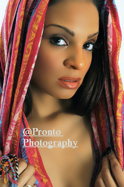 Female model photo shoot of Pronto Photography and Lencia the Model  in studio, makeup by Tona Michelle