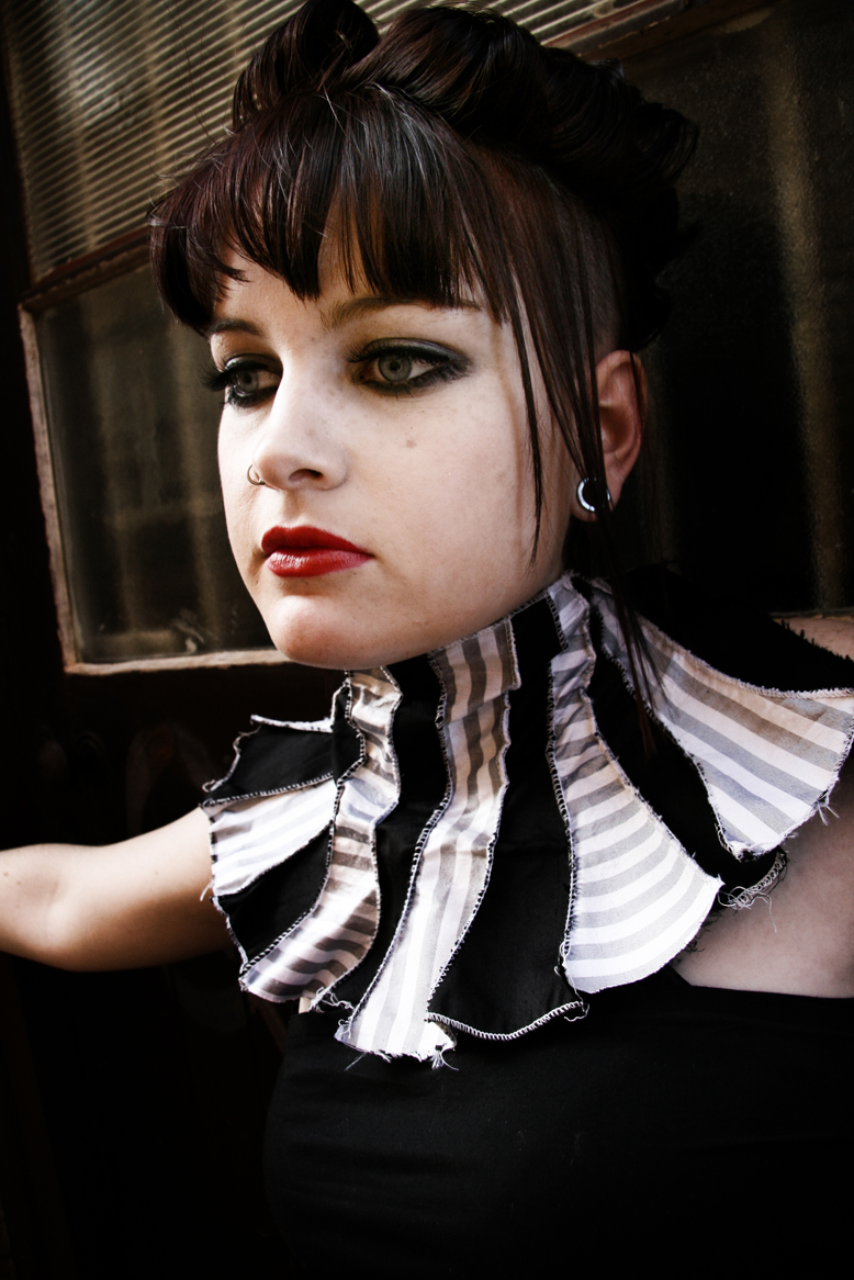 Female model photo shoot of RTSHOTS, wardrobe styled by Asylum in Red