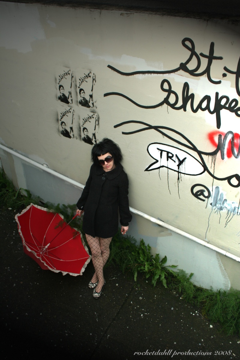 Female model photo shoot of rocketdahll productions in PDX pedestrian tunnel