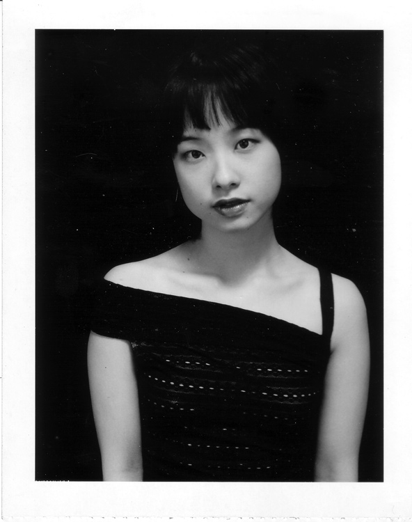Female model photo shoot of Sample Polaroids