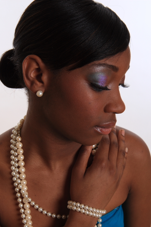 Female model photo shoot of Glam2Luxe in Queens NY, makeup by Glam2Luxe