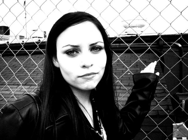 Female model photo shoot of Claudia Night in Vons Parking Lot Fence , makeup by Makeup By Simulacrum