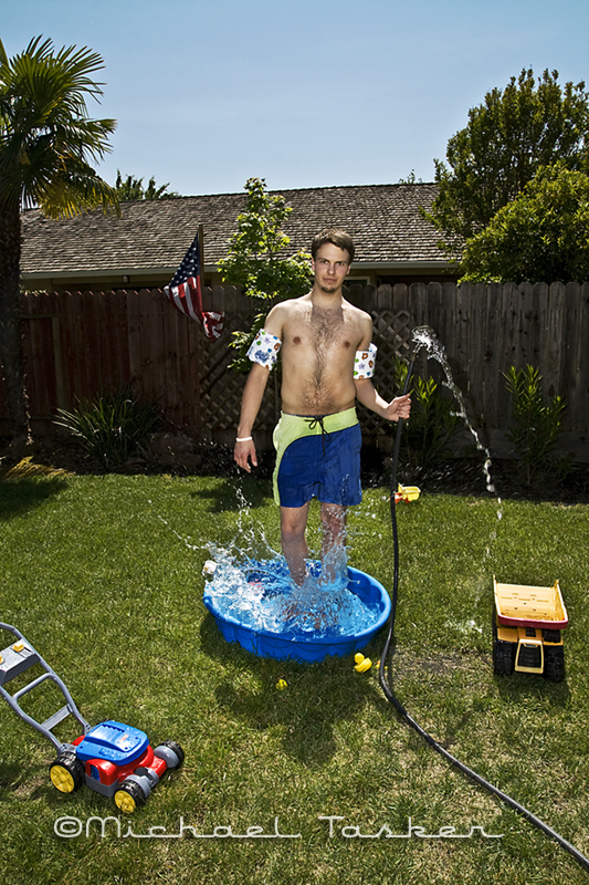 Male model photo shoot of TaskerPHOTOGRAPHY in a backyard