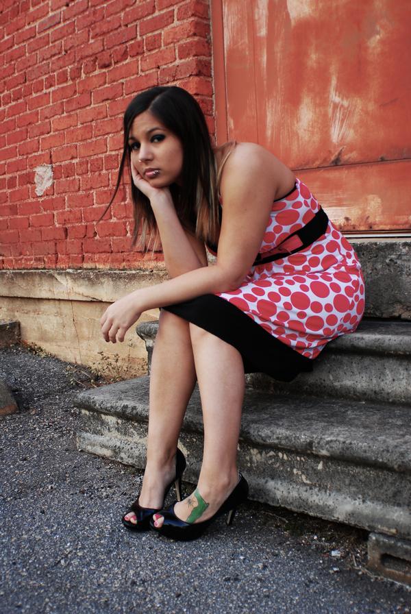 Female model photo shoot of Desirae K by Eric Graham Photography in Downtown Greenville, SC