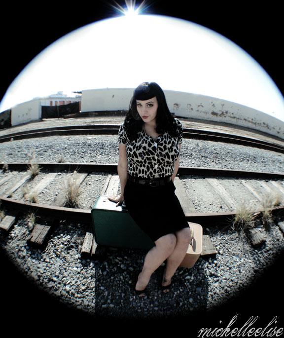 Female model photo shoot of Darla Deville in Long Beach Railroad tracks