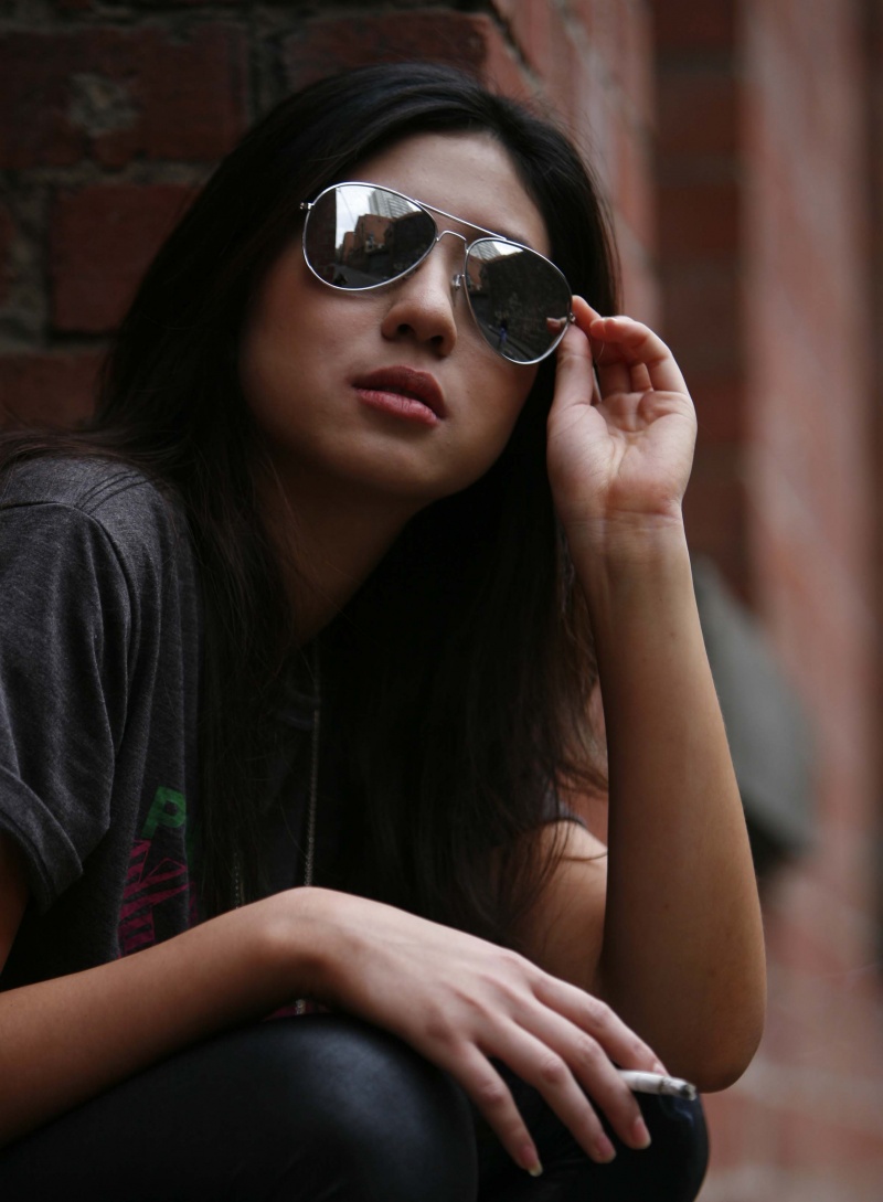 Female model photo shoot of Monica D in An alley around Elizabeth St.