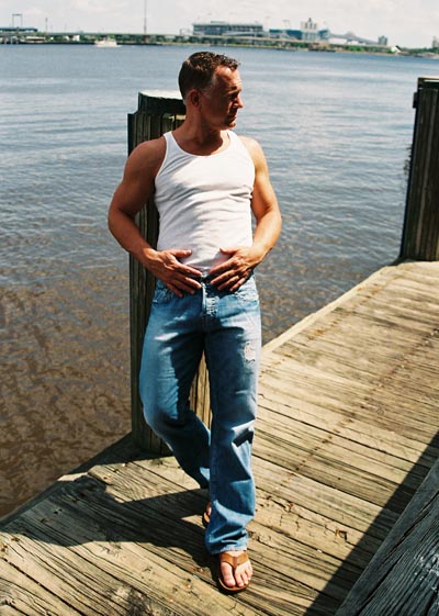 Male model photo shoot of scandoc by KorokStudios in Jacksonville waterfront
