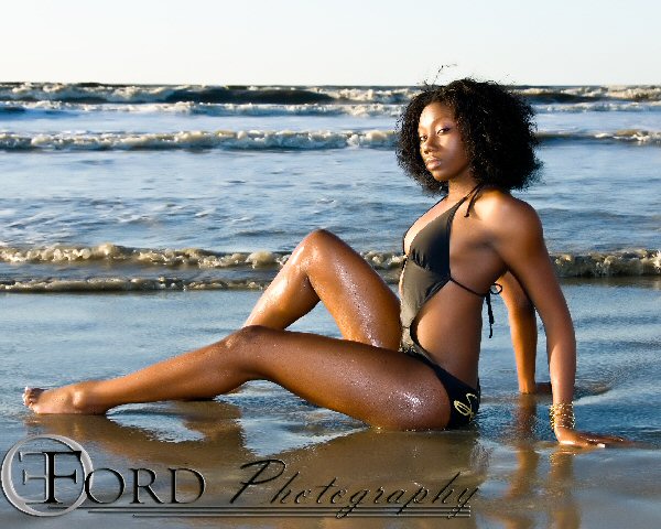 Female model photo shoot of Chyna N by Akil A in Galveston Beach