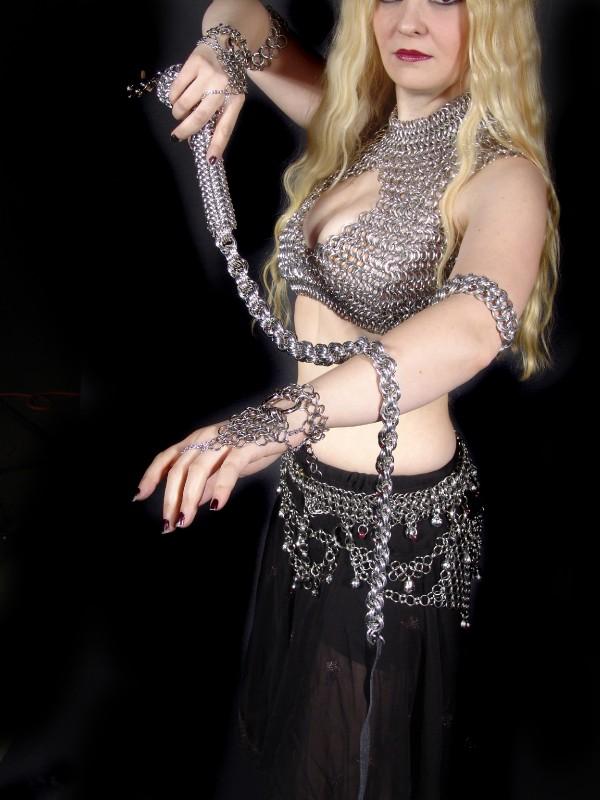 Female model photo shoot of Syn Fatale, clothing designed by Pendragon Chainmail