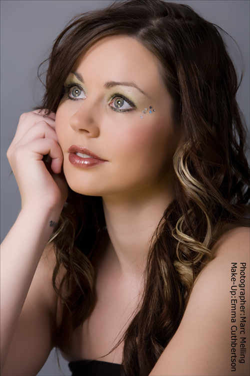 Female model photo shoot of emamakeup by Marc Melling in Studio