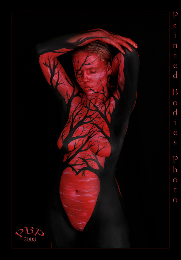 Female model photo shoot of Sekhmet Grr, body painted by Painted Bodies