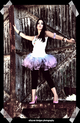 Female model photo shoot of rock your tutu and Melanie Davis by Alley Kat Photography in pensacola, fl 