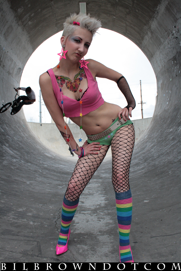 Female model photo shoot of Pinkie Skullie in Baxter Ave Train station