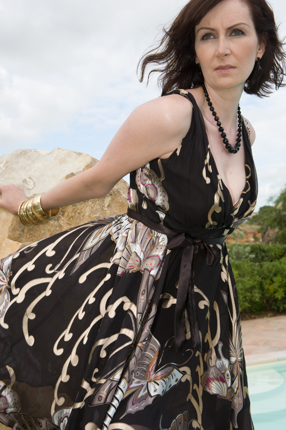 Female model photo shoot of CindyS by Adrian Jackson in Sardinia, makeup by Vanessa Collins Makeup
