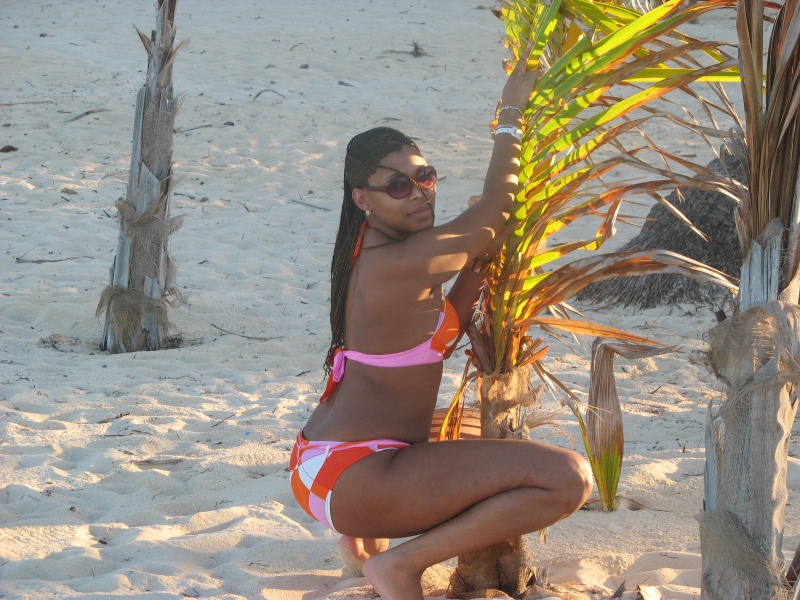 Female model photo shoot of strawberry_redd in beach