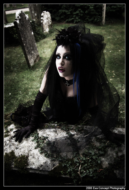 Female model photo shoot of Deadly D0ll by Dark Romantics  in Stoneham Graveyard, clothing designed by Mort Couture