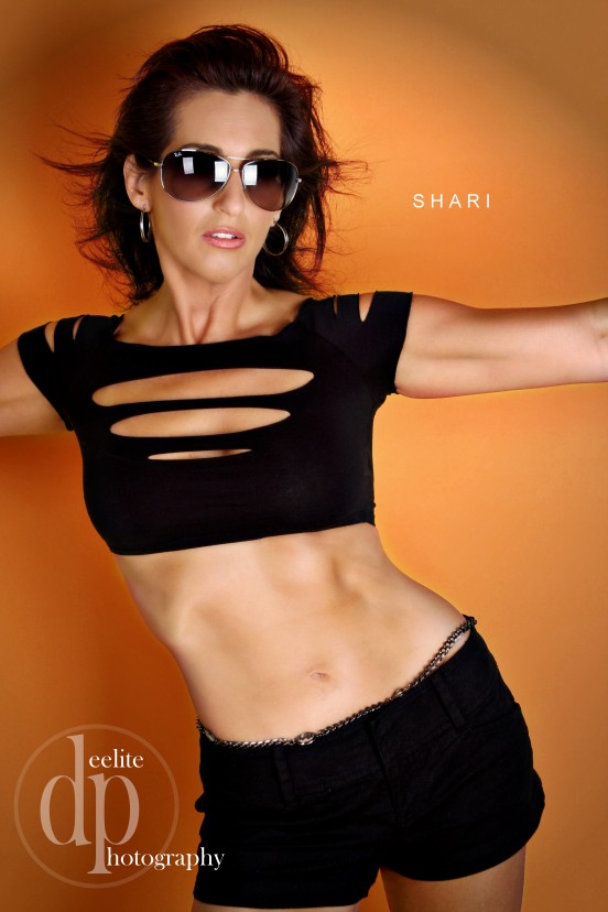Female model photo shoot of ShariFitness by Deelite Photography in Atlanta, GA, makeup by nancy hancock