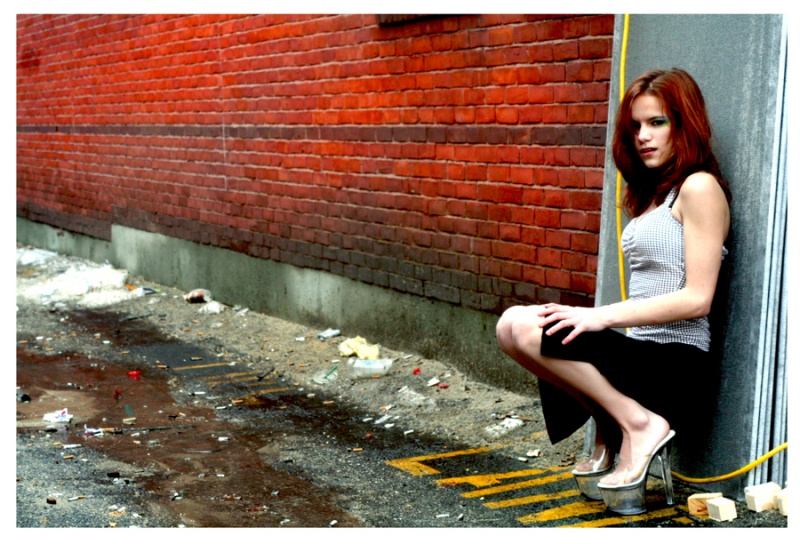 Female model photo shoot of Holly E C by Calico Roni Rosenberg in some alley way