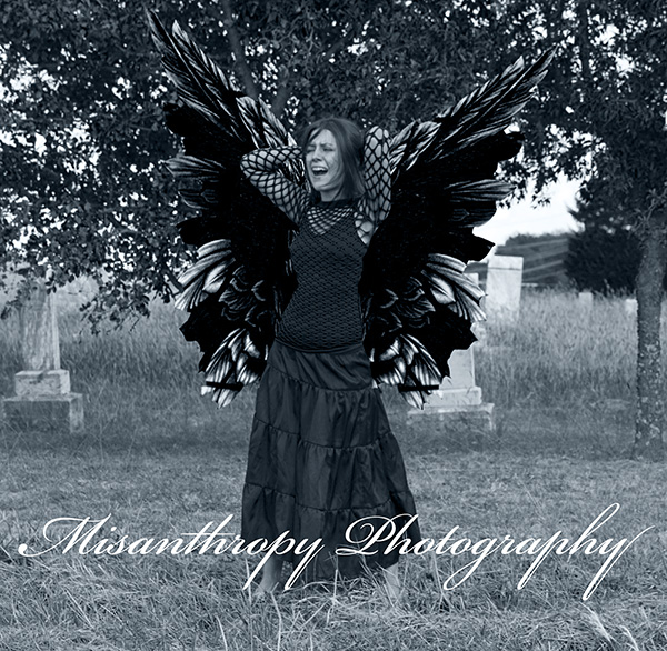 Female model photo shoot of Misanthropy Photography in Zion Cemetery, Texas