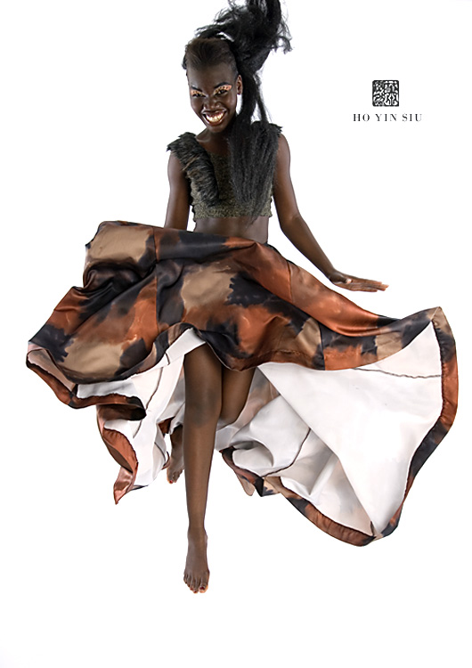 Male and Female model photo shoot of Hoyin Siu and SUDANESEBEAUTY, clothing designed by Sodaliscious