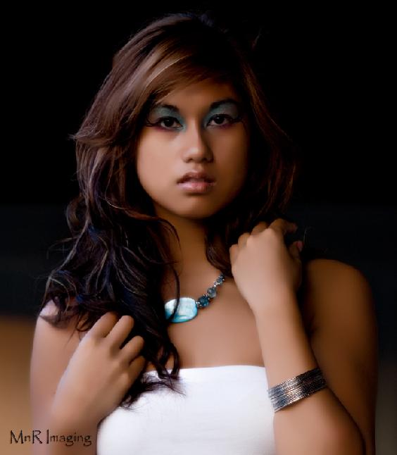Female model photo shoot of aRena Rattana by MnR Imaging in Grand Rapids, MI