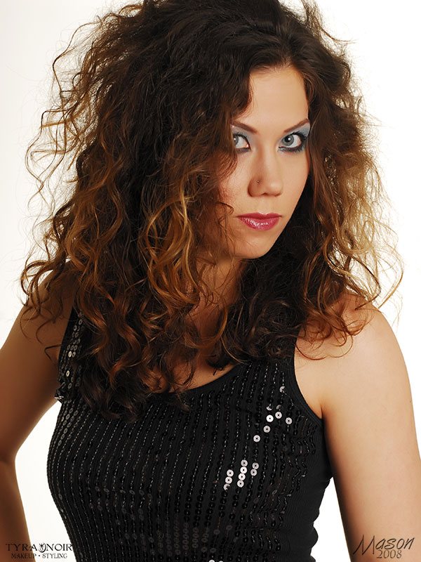 Female model photo shoot of curly sue
