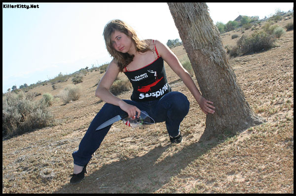 Female model photo shoot of Killer Kitty Clothing in Desert
