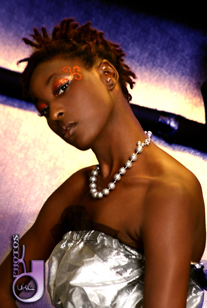 Female model photo shoot of Chalon by kdukesphoto in Ivy Lounge-Dallas, TX, makeup by Mel B Makeup Artistry