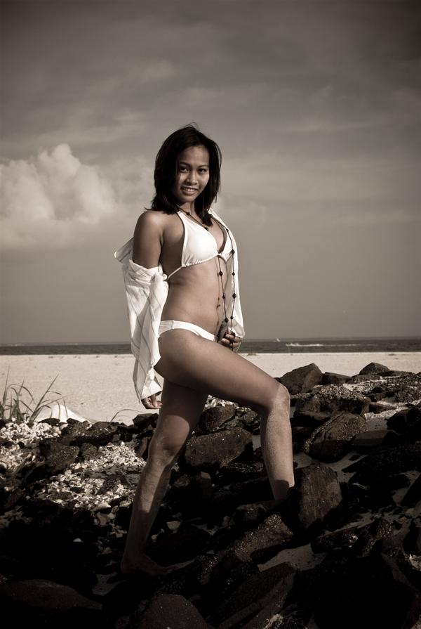 Female model photo shoot of Rima Ramos by Lucky Girl Photography in Fort Pickens