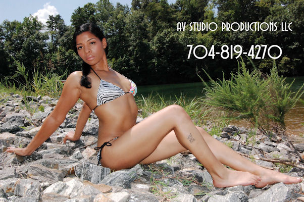 Female model photo shoot of Rashidah X by The AV way and 5-Flavas Productions in Lake Norman, NC, makeup by Ellamakeup