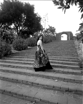 Female model photo shoot of Persephone Willows in San Luis Rey Mission, Oceanside, CA
