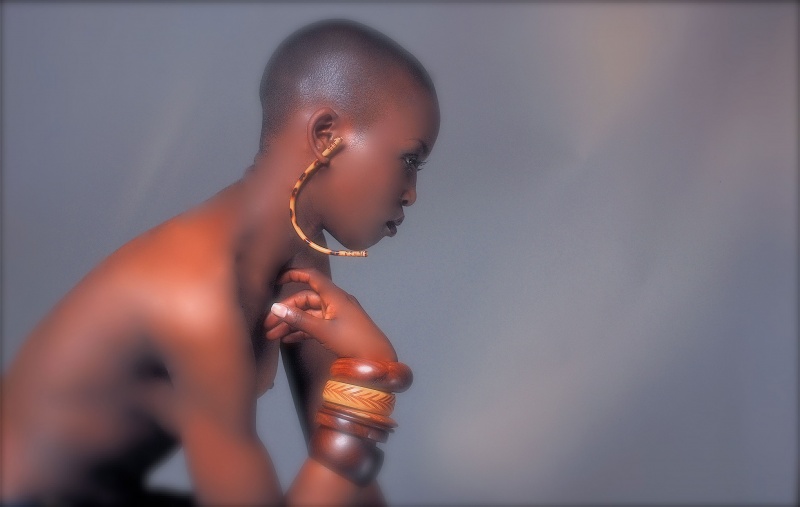 Female model photo shoot of Lanyero by Mr Ian Watts, wardrobe styled by Lauraine Bailey Styling, makeup by Alicia Samuels