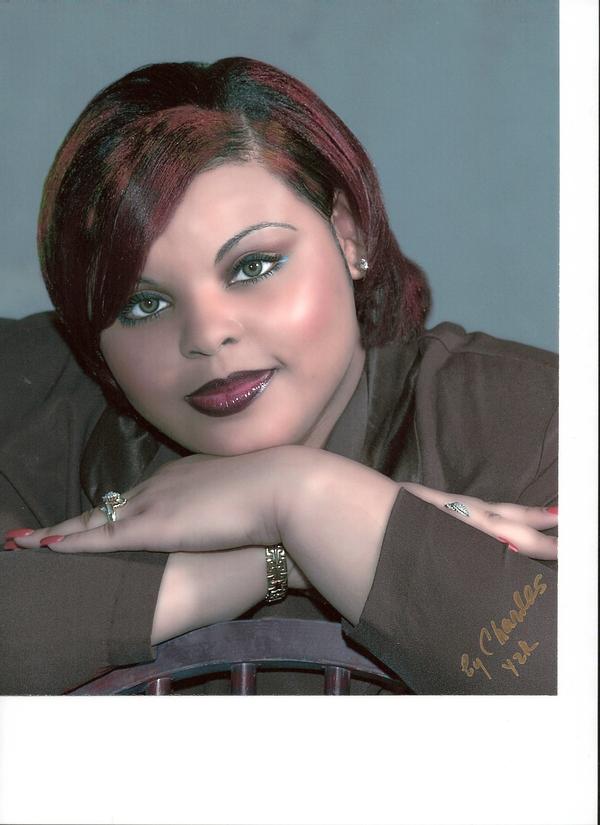 Female model photo shoot of Crystal Taylor-Tolbert in Charle's Studio, makeup by Facesbycrystal